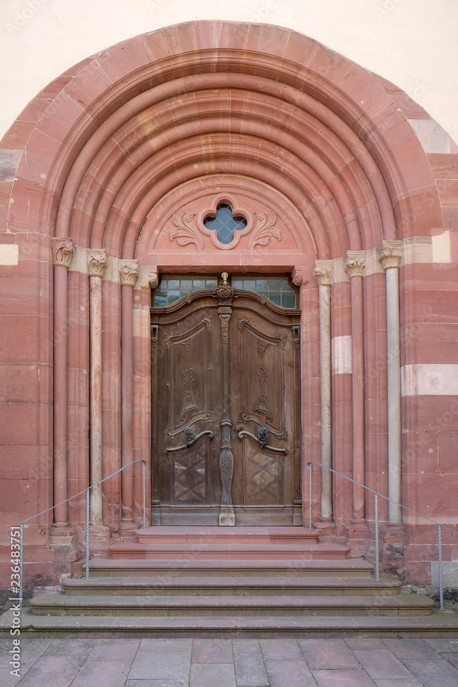 Entrance door of Cistercian Abbey of Bronbach in Reicholzheim near Wertheim, Germany