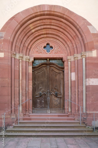 Entrance door of Cistercian Abbey of Bronbach in Reicholzheim near Wertheim, Germany