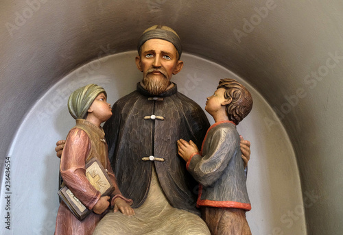 Josef Freinademetz missionary in China sculpted by Leonhard Delago of Bula in the Saint George church in Luson, Italy photo