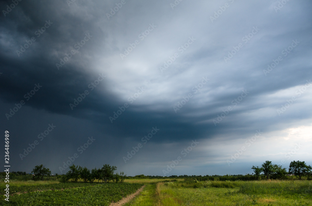 Storm clouds over the green field, Rain summer clouds. Storm clouds over the green field, Rain summer clouds.