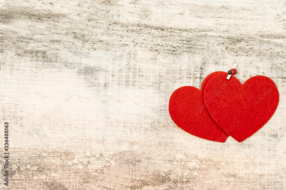 Hearts on old wooden table, Valentines day concept Hearts on old wooden table, Valentines day concept
