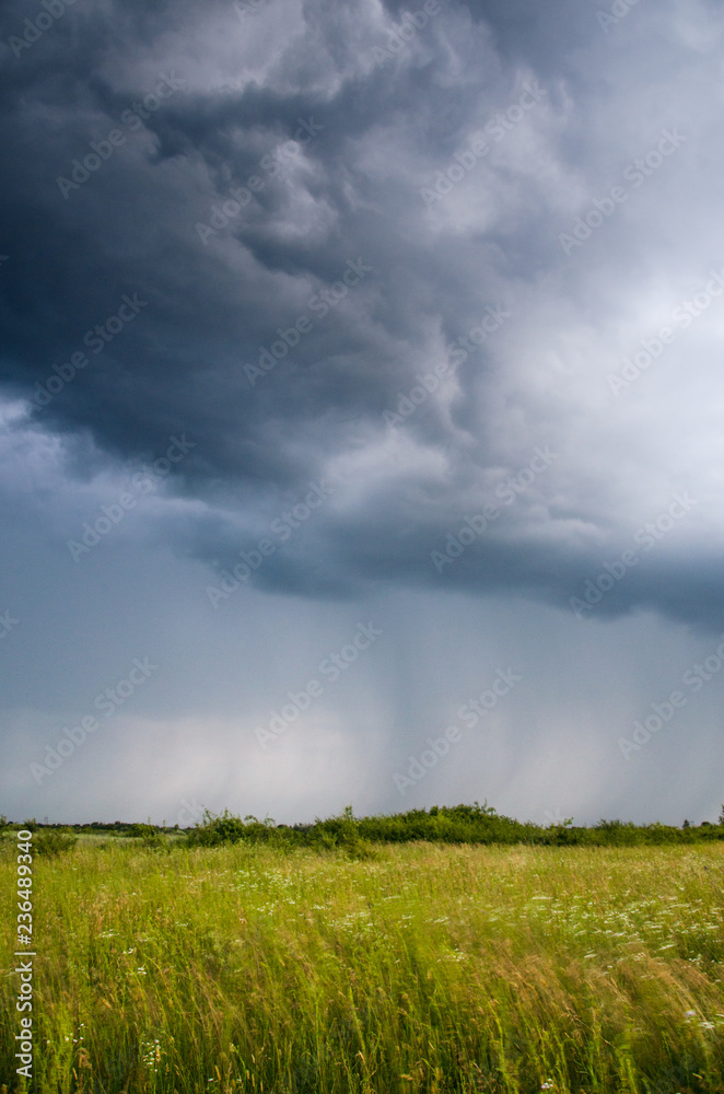 Storm clouds over the green field, Rain summer clouds. Storm clouds over the green field, Rain summer clouds.