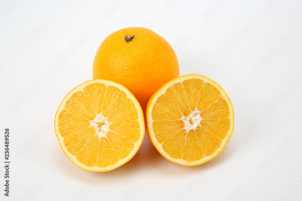 Cut citrus fruit of orange on white background