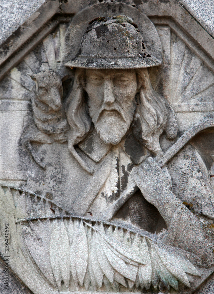 Obraz premium Jesus the Good Shepherd, headstone on Mirogoj cemetery in Zagreb, Croatia