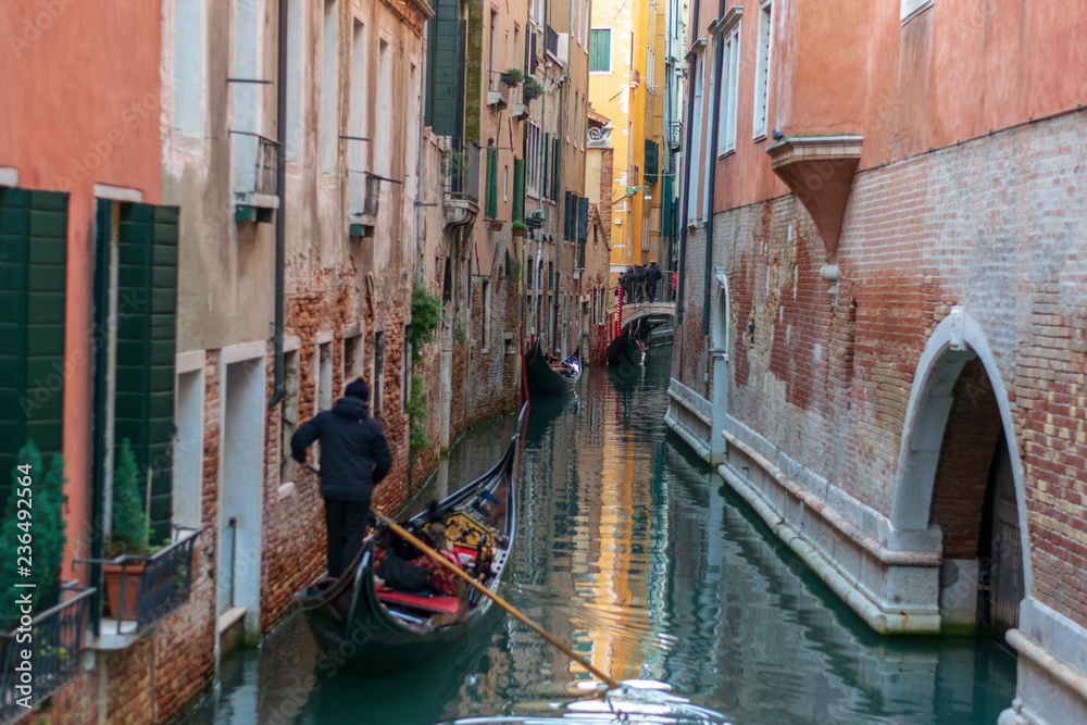gondolas on a canal in venice