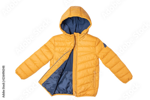 Childrens winter jacket. Stylish childrens yellow warm down jacket isolated on white background. Winter fashion. photo