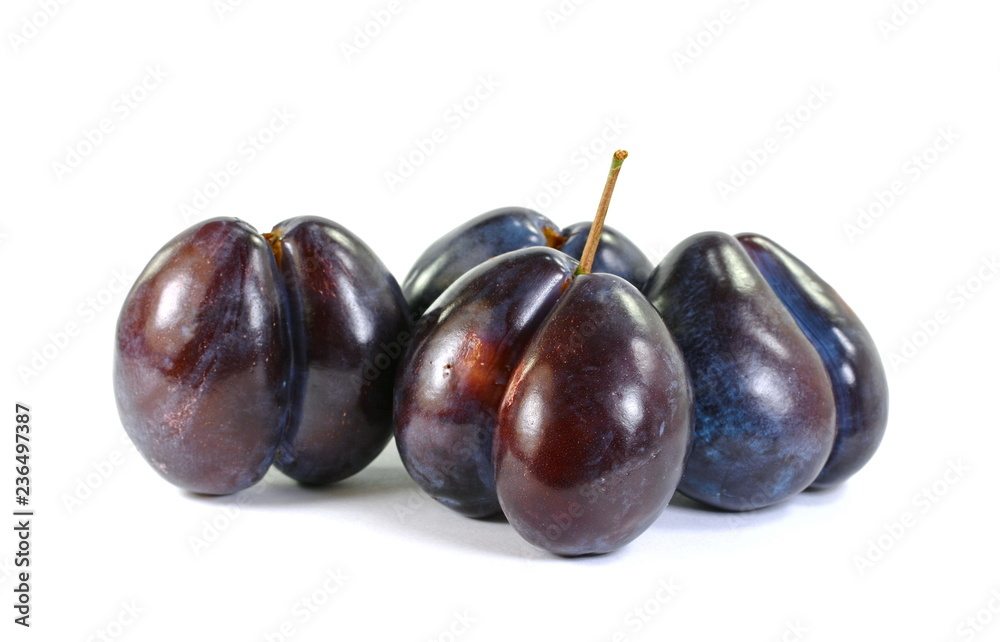 plums isolated on the white background plums isolated on the white background
