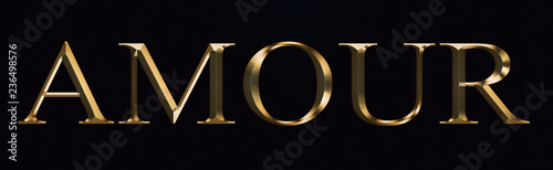 Amor text made from in gold on black background. Shiny festive party Gold font.