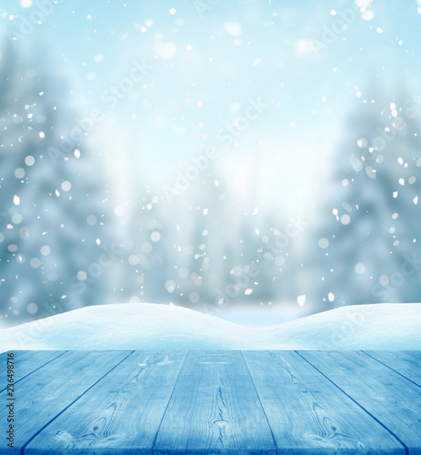 Merry Christmas and happy New Year greeting background with table .Winter landscape with snow