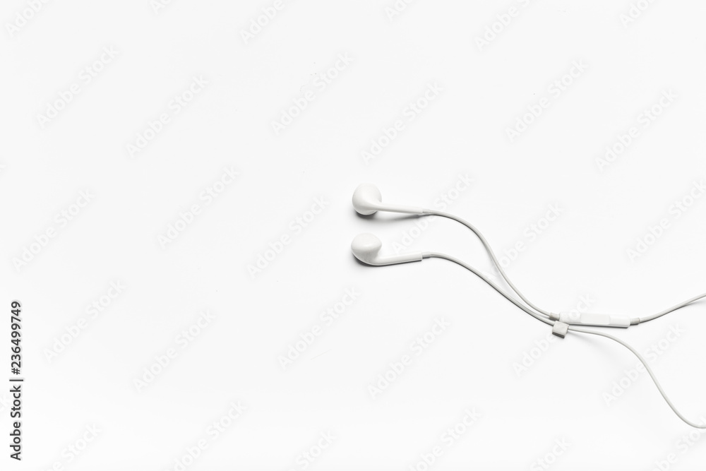 white Earphones isolated on white background white Earphones isolated on white background