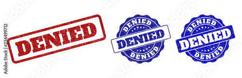 DENIED grunge stamp seals in red and blue colors. Vector DENIED watermarks with scratced surface. Graphic elements are rounded rectangles, rosettes, circles and text labels.