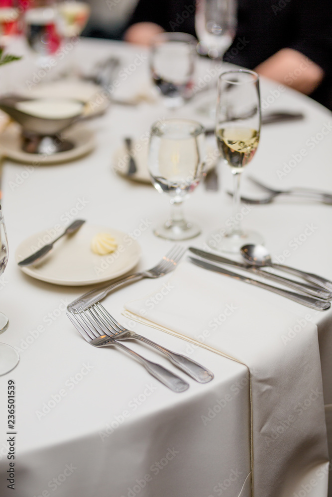 Table Setting in Restaurant, White Linens Table Setting in Restaurant, White Linens