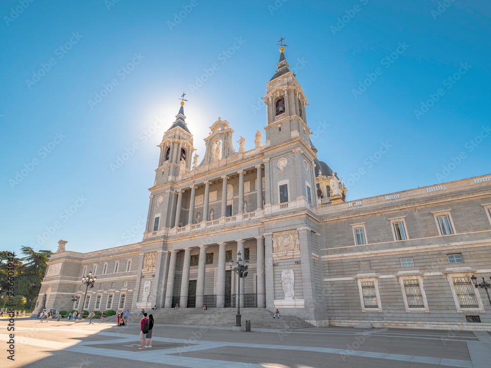 Panorama of the facade of the Almudena Cathedral (catedral de la Almudenal) one of the most important monuments of Madrid, Spain