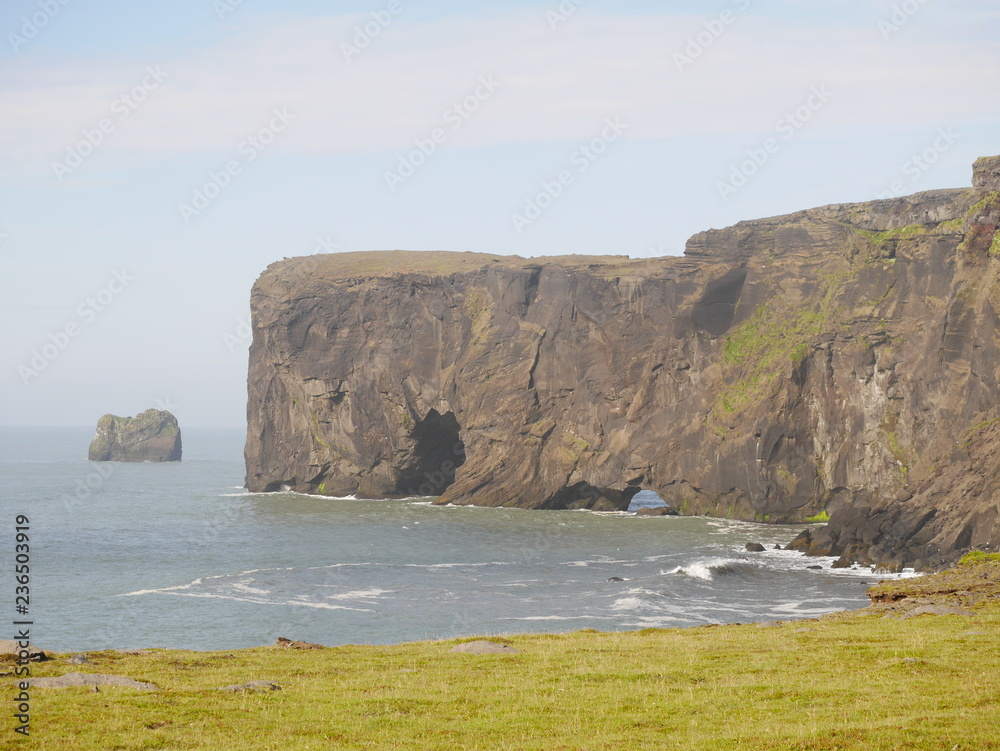 Dyrholaey Peninsula with Sea Arches from cliff top