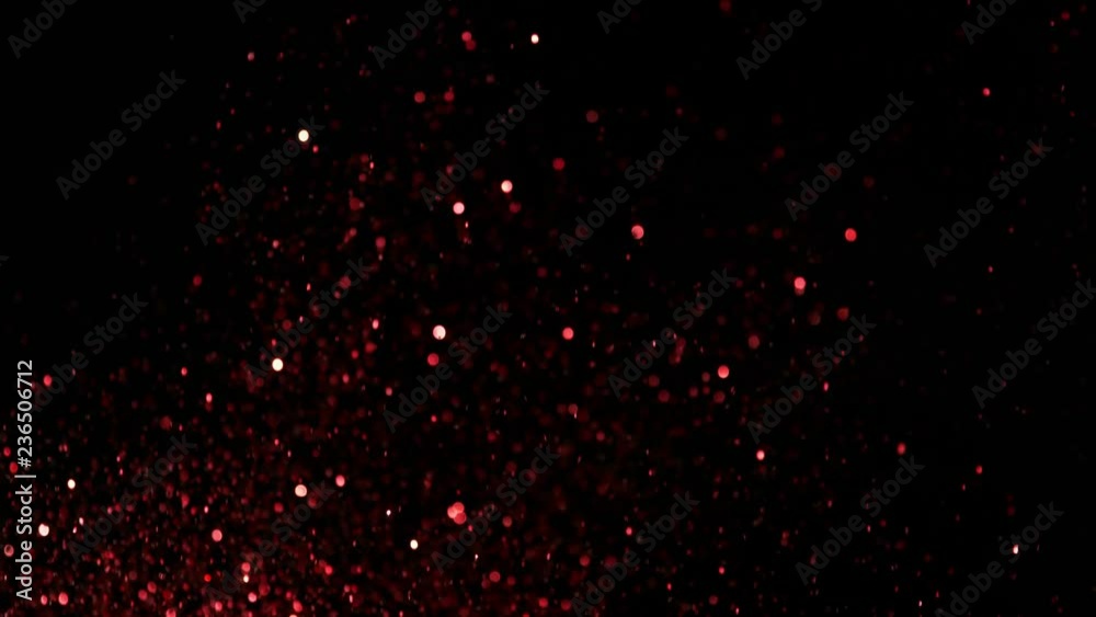 Red glitter explosion in super slow motion shooted with high speed cinema camera at 1000fps 4K. Red glitter explosion in super slow motion shooted with high speed cinema camera at 1000fps 4K.