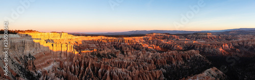 Aerial panoramic view of the beautiful American Canyon Landscape during a vibrant sunrise. Taken in Bryce Canyon National Park, Utah, United States