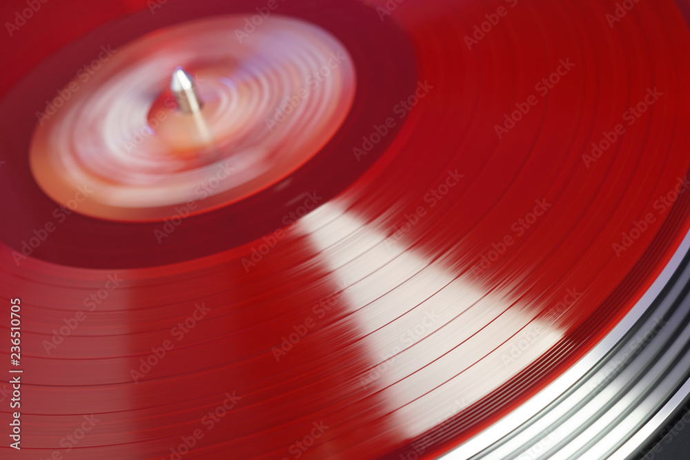 A Red Vinyl Record Close Up On A Dark Background Falling Beam Of Light On A A Red Vinyl Record Close Up On A Dark Background Falling Beam Of Light On A