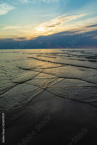 calm blue sunset over clear water in baltic sea