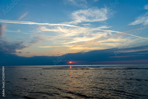 Fototapeta Naklejka Na Ścianę i Meble -  calm blue sunset over clear water in baltic sea