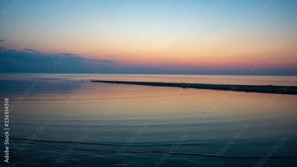 calm blue sunset over clear water in baltic sea