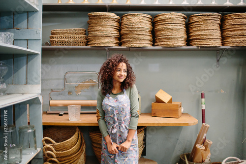 Fotografie, Obraz Adorable woman posing in shop storage