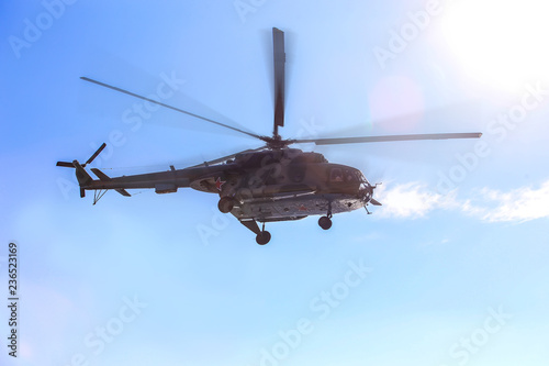 Russian military helicopter flies in the sky