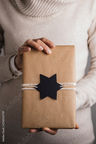 Woman holding gift package