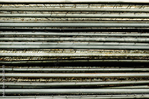 stack of metal. Folded iron fences