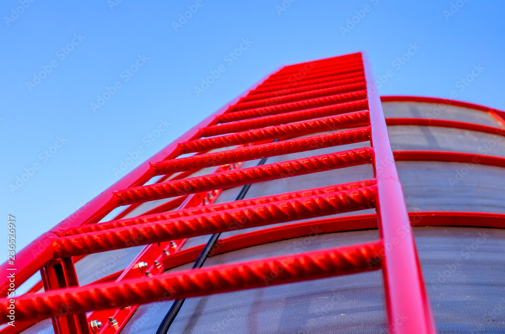 red ladder going into the sky