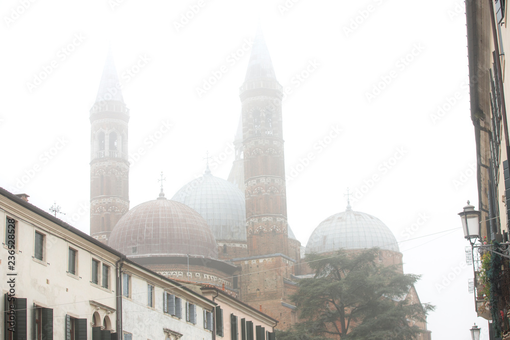 Church of St. Antonio in the city of Padova, Italy. Heavy fog in the city of Padova. Padua. Side view of the Basilica of St Anthony, iconic landmark and sightseeing in Padua, Italy. travel to Italy