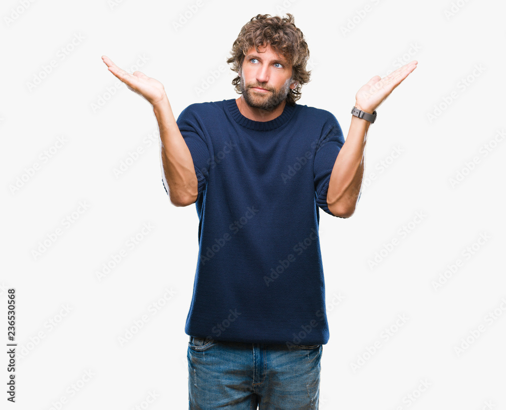 Handsome hispanic model man wearing winter sweater over isolated background clueless and confused expression with arms and hands raised. Doubt concept. Handsome hispanic model man wearing winter sweater over isolated background clueless and confused expression with arms and hands raised. Doubt concept.