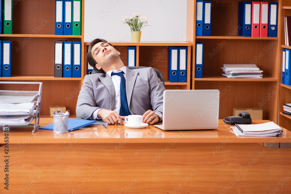 Young employee working in the office