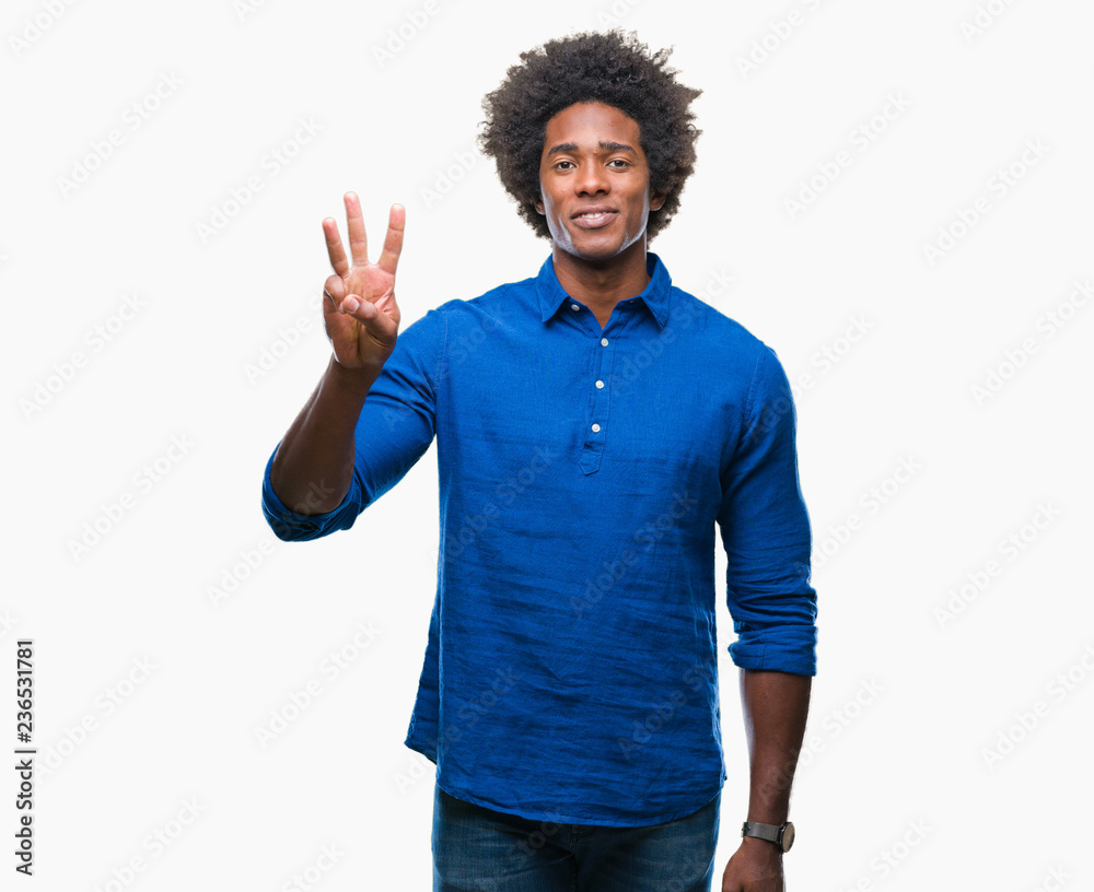 Afro american man over isolated background showing and pointing up with fingers number three while smiling confident and happy. Afro american man over isolated background showing and pointing up with fingers number three while smiling confident and happy.