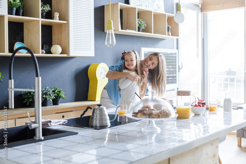 © Lumina/Stocksy - Mother Cuddling Her Child