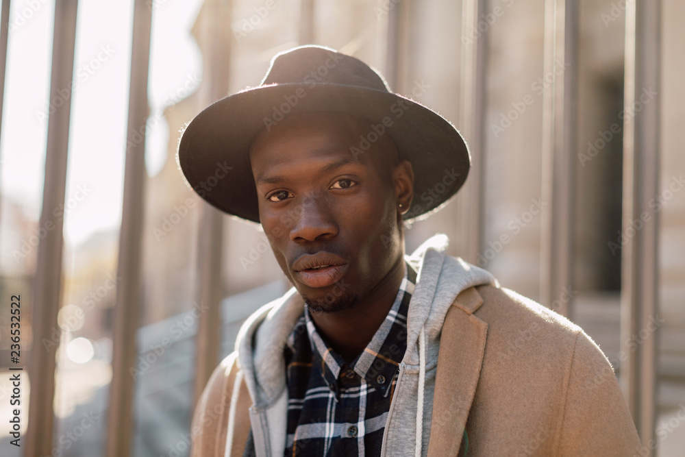 Closeup portrait of stylish man standing on the street in winter. Closeup portrait of stylish man standing on the street in winter.