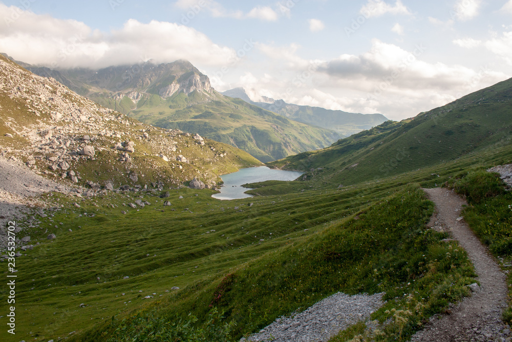 Fototapeta premium Swiss Alps Landscapes with Mountains, Peaks, lakes and tracks