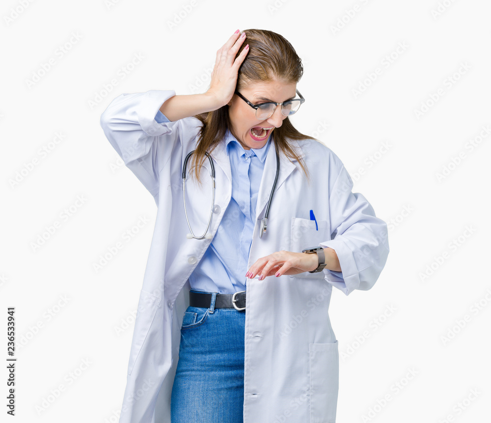 Middle age mature doctor woman wearing medical coat over isolated background Looking at the watch time worried, afraid of getting late Middle age mature doctor woman wearing medical coat over isolated background Looking at the watch time worried, afraid of getting late