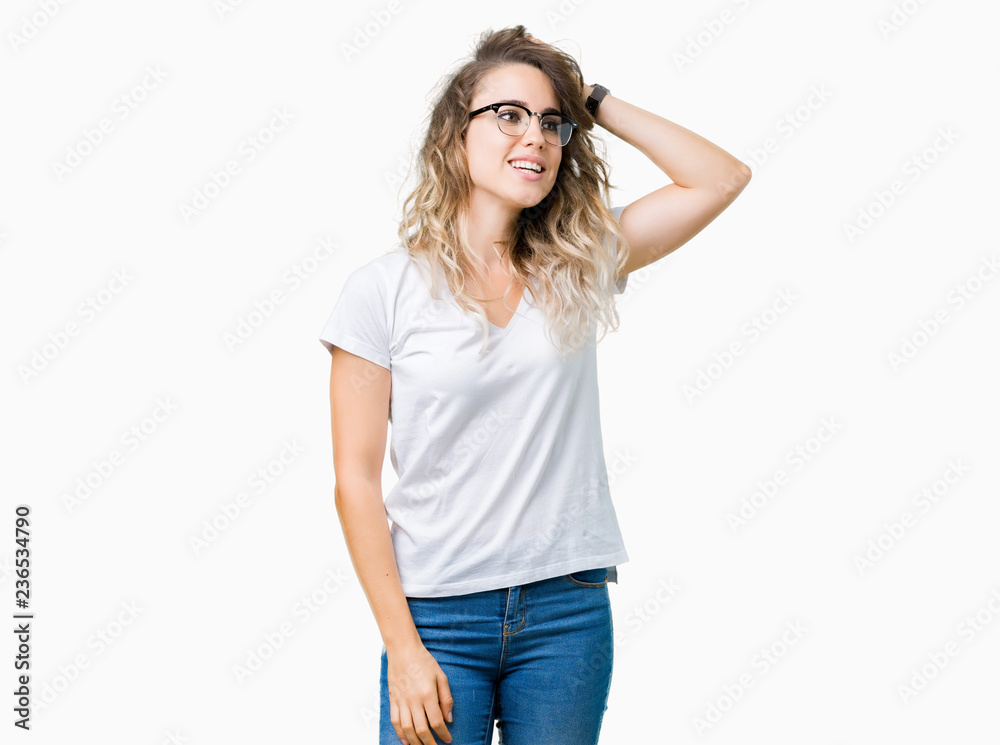Beautiful young blonde woman wearing glasses over isolated background Smiling confident touching hair with hand up gesture, posing attractive Beautiful young blonde woman wearing glasses over isolated background Smiling confident touching hair with hand up gesture, posing attractive