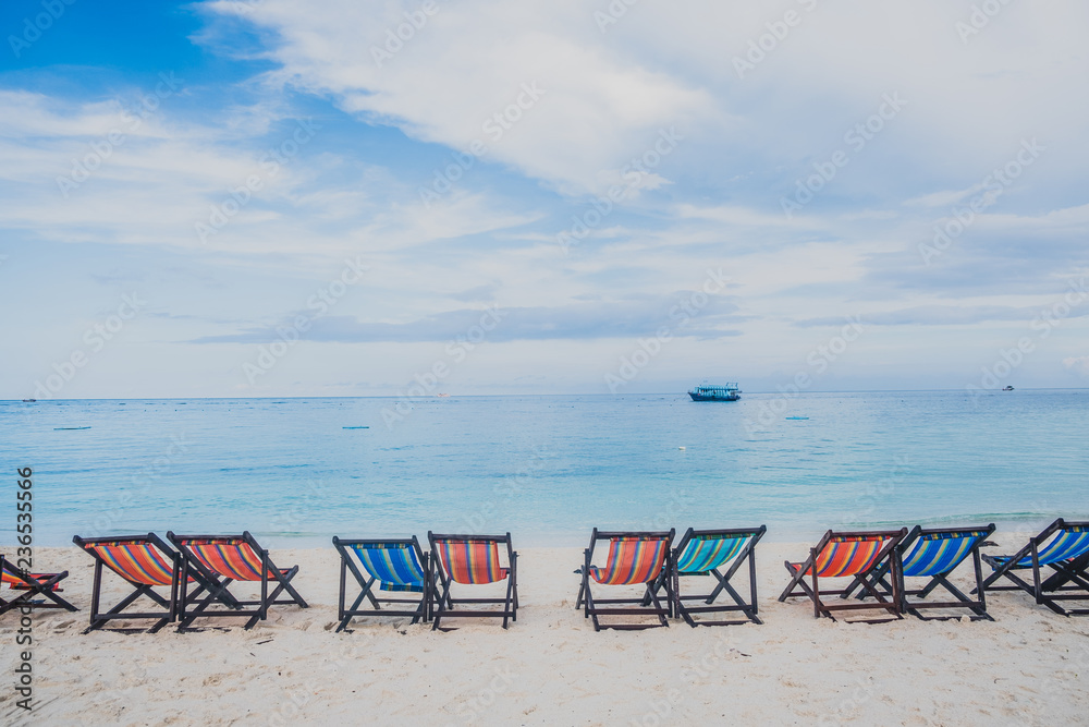 colorful beach chairs on the white sand beach at koh Nang Yuan in Suratthani province Thailand