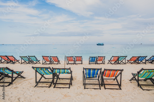 Fototapeta Naklejka Na Ścianę i Meble -  colorful beach chairs on the white sand beach at koh Nang Yuan in Suratthani province Thailand