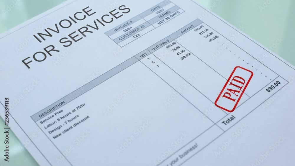 Invoice for service paid, hand stamping seal on commercial document, business Invoice for service paid, hand stamping seal on commercial document, business