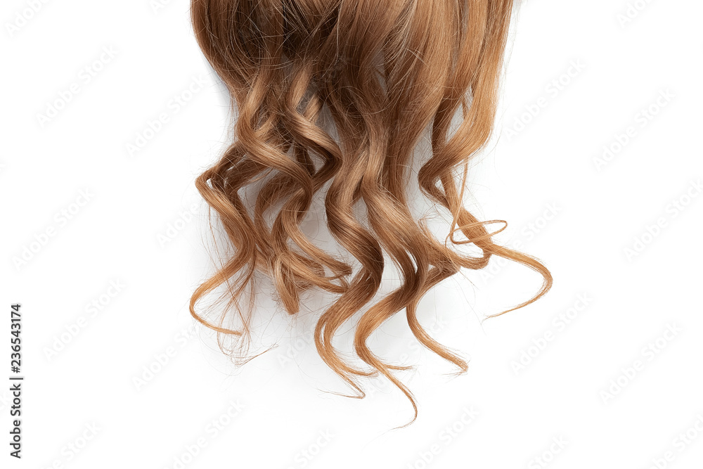 Natural wavy brown hair on white background Natural wavy brown hair on white background