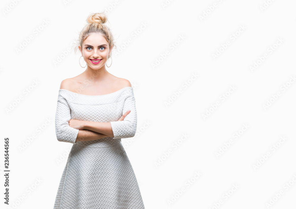 Young beautiful blonde and blue eyes woman over isolated background happy face smiling with crossed arms looking at the camera. Positive person. Young beautiful blonde and blue eyes woman over isolated background happy face smiling with crossed arms looking at the camera. Positive person.