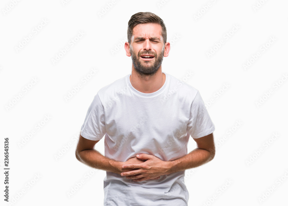 Young handsome man over isolated background with hand on stomach because indigestion, painful illness feeling unwell. Ache concept. Young handsome man over isolated background with hand on stomach because indigestion, painful illness feeling unwell. Ache concept.