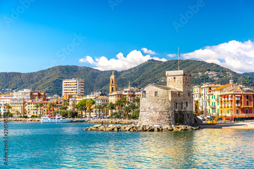 Beautiful view of coastline and picturesque seaside village Rapallo. Little harbor and houses.