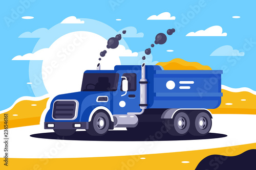 Flat loaded dump truck with sand is going to unload at work.