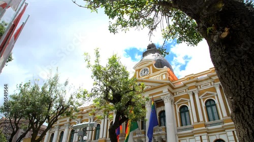 Bolivian Federal flags flying in Plaza Murillo at the Government Palace seat of Parliament National Landmark South America photo