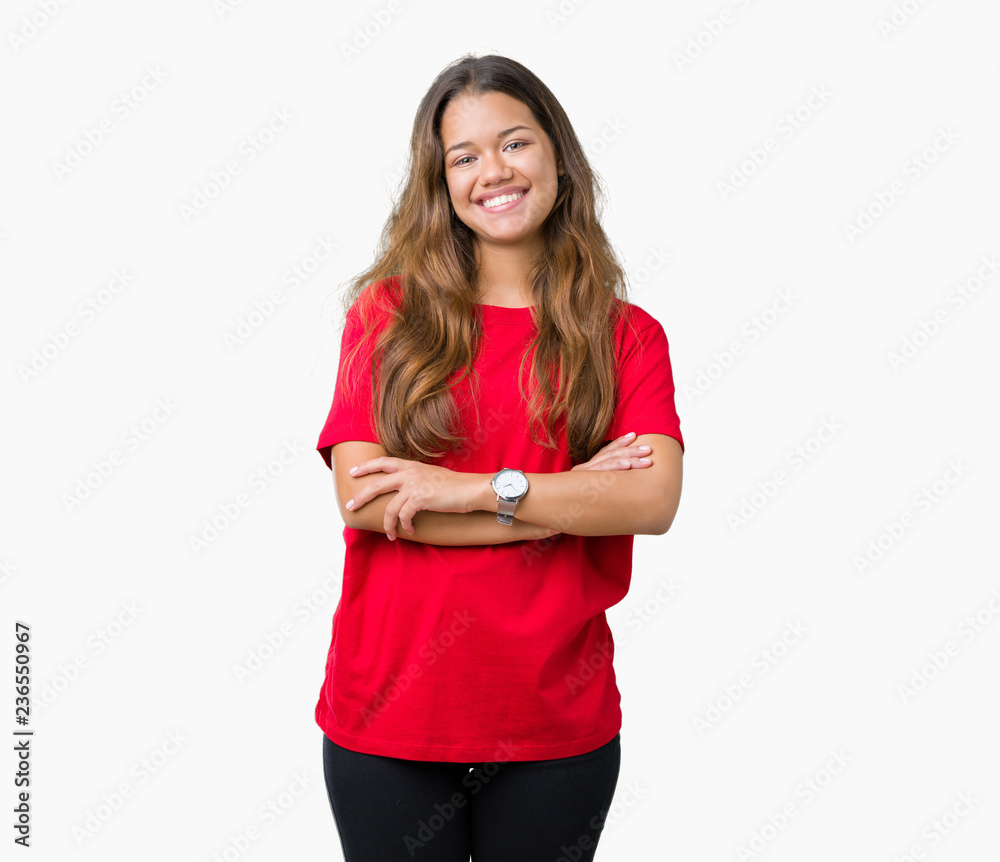 Young beautiful brunette woman wearing red t-shirt over isolated background happy face smiling with crossed arms looking at the camera. Positive person. Young beautiful brunette woman wearing red t-shirt over isolated background happy face smiling with crossed arms looking at the camera. Positive person.