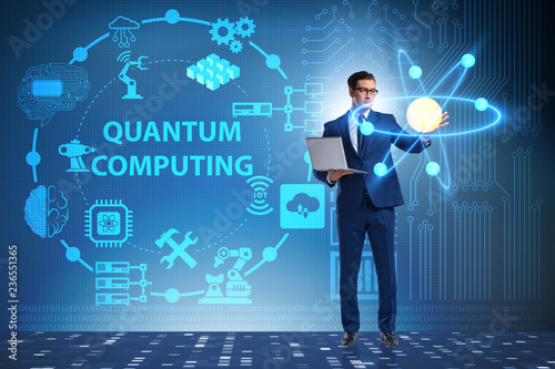 Slika na platnu Businessman pressing virtual button in quantum computing concept