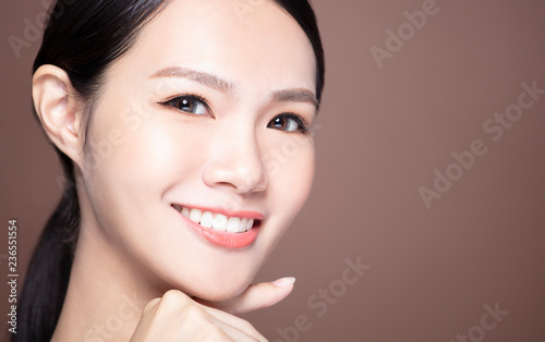 young smiling woman with natural makeup